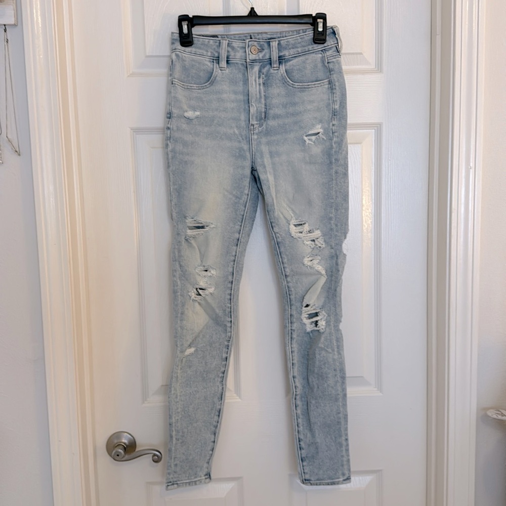 distressed light wash jeans